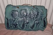 Ancient Greek stone wall plaque of The Three Ladies of Knossos