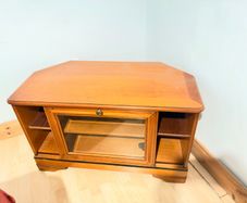 Wooden TV stand with glass door