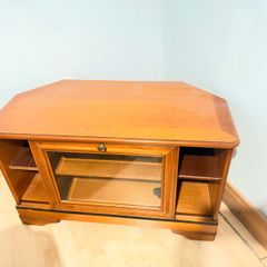 Wooden TV stand with glass door