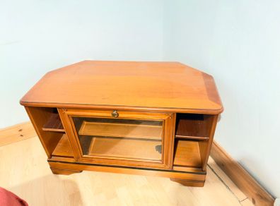 Wooden TV stand with glass door