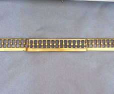 Antique brass fireplace fender