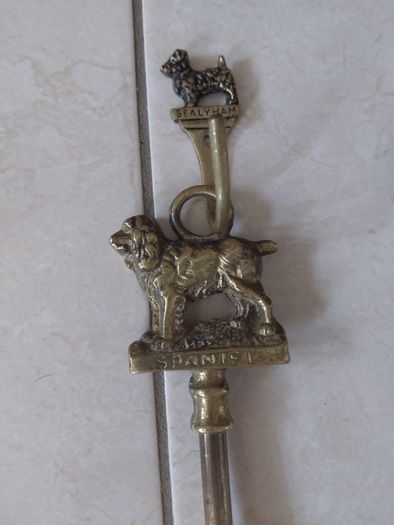 Antique French fireplace set 1950s features handles with various figures with animal finials