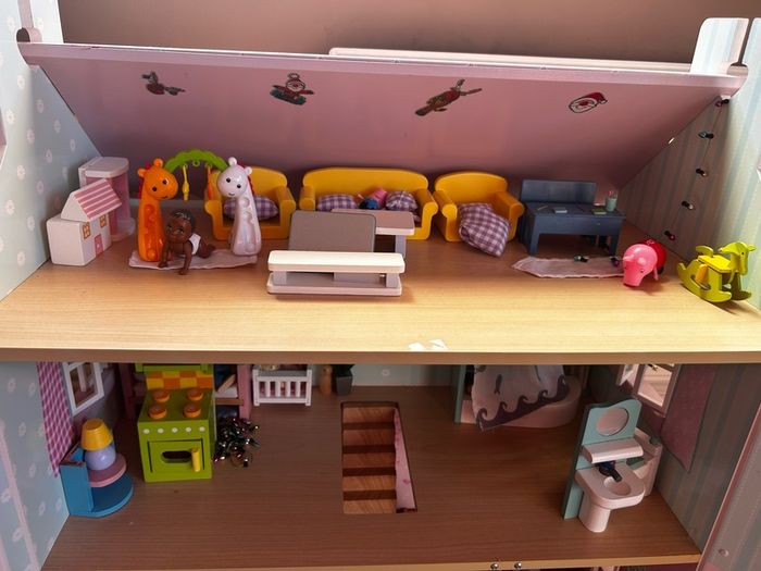 Wooden dolls house with accessories