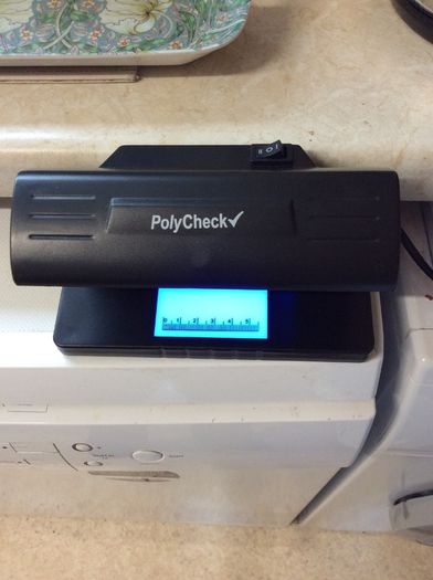 Polycheck Bank Note Checker. 9 Watts Ultra Violet Bank Note Checker.