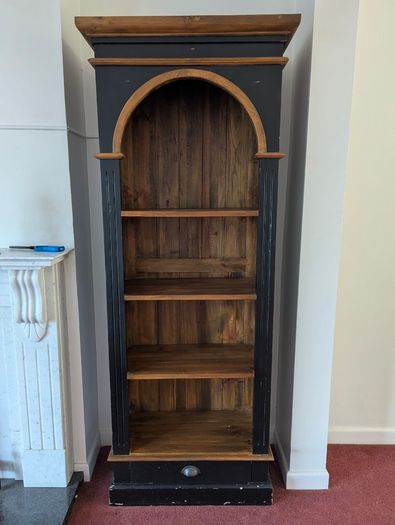 Tall black and wood colour bookcase