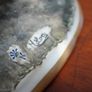 Porcelain Figurine of Seated Elderly Man with Birds Image 4