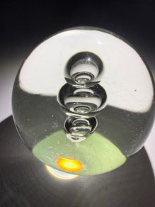 Clear glass three-bubble paperweight