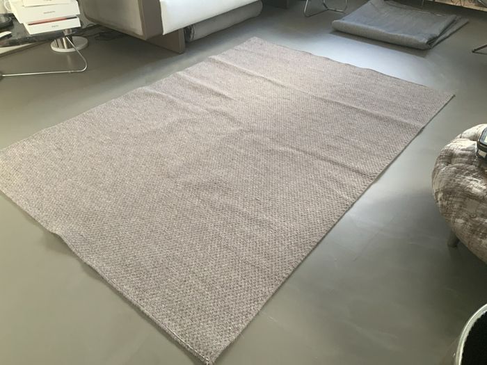 Woollen dark beige rug