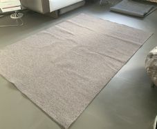 Woollen dark beige rug