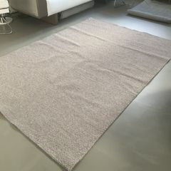 Woollen dark beige rug