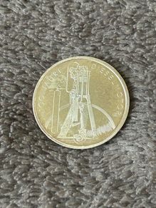 This is a German 10 Deutsche Mark (DM) silver commemorative coin issued in 1997 to mark the 100th anniversary of the diesel engine