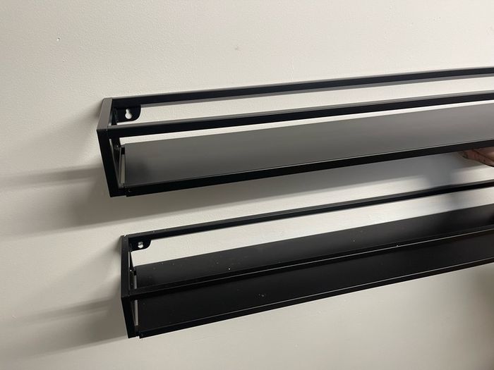 Black metal shelves