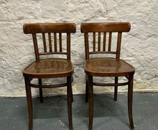 A pair of matching Polish made Bentwood chairs.
