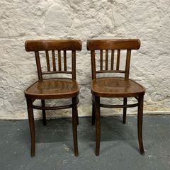 A pair of matching Polish made Bentwood chairs.