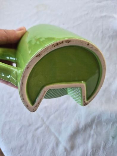 A novelty flick football interactive coffee mug