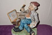 Capodimonte statue - Man painting on bench