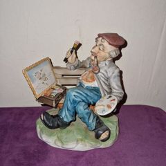 Capodimonte statue - Man painting on bench