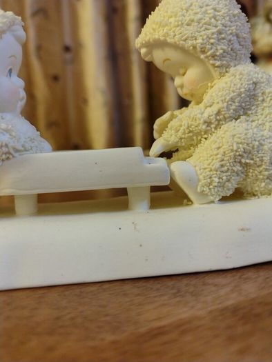 Snowbabies from Department 56. Porcelain.