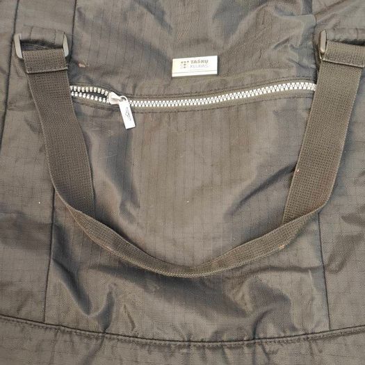 Large black expandable travel bag with shoulder strap