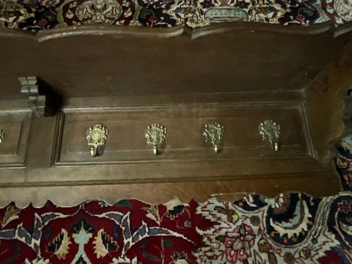 Old coat rack with brass hooks, large and heavy