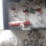 Newgrange candle holders new in box .20 euro .Would make a lovely christmas present .Glass with red and candles Image 2