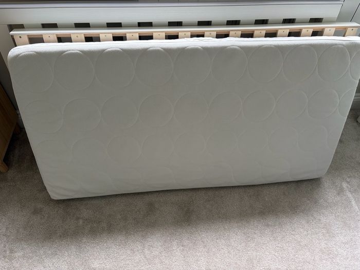 Cot bed with mattress