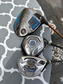 Ping and Taylor Made golf clubs