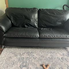 Genuine black leather couch