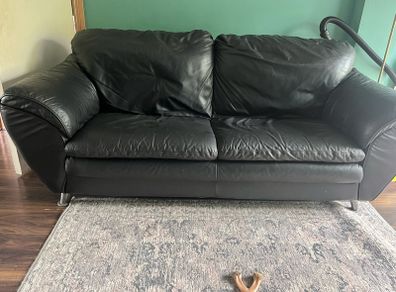 Genuine black leather couch