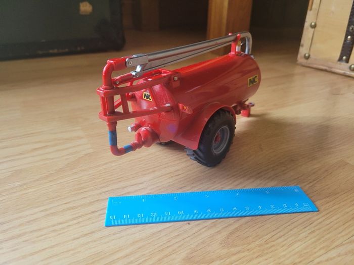 Toy farm shed, animals and machinery