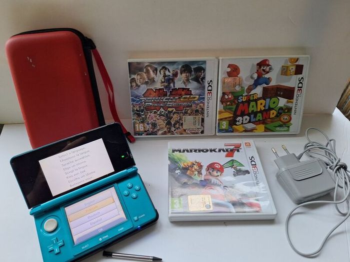 Aqua Blue Nintendo 3DS with games