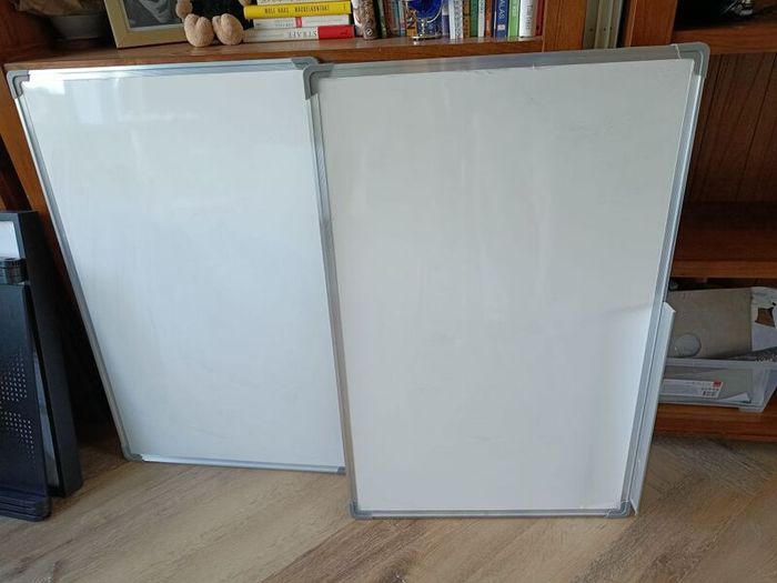 two whiteboards 58 X 90 cm