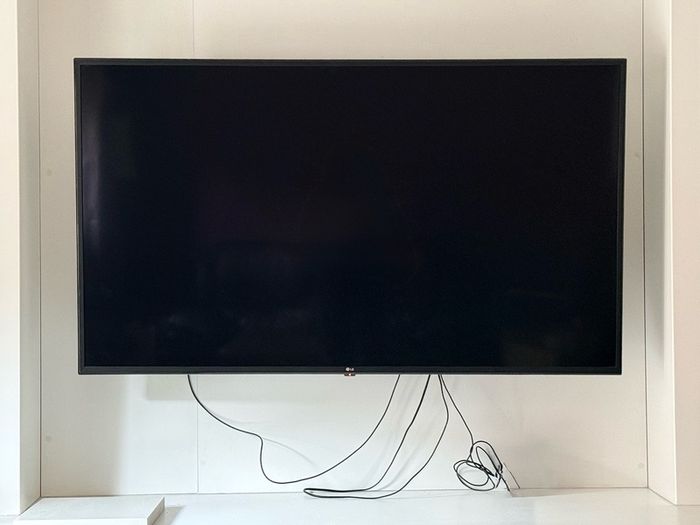 55" HD LG TV and wall bracket