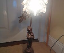 French Art Nouveau style vintage lamp featuring a spelter bronze figure