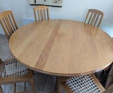 solid oak dining table and 6 chairs