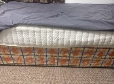 Single bed frame with headboard and mattress
