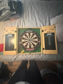 Dartboard with cabinet
