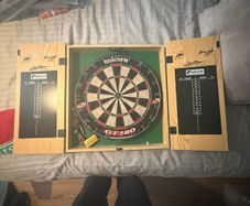 Dartboard with cabinet