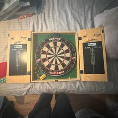 Dartboard with cabinet