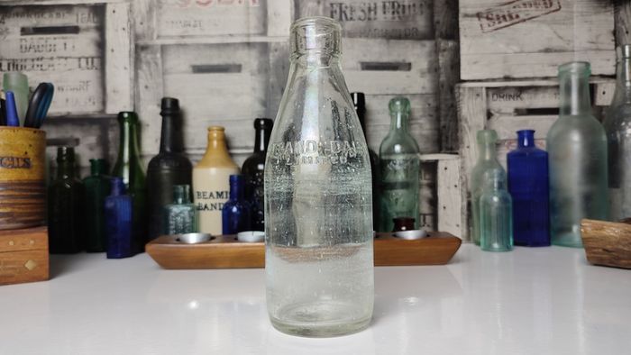 361 - Strand Dairy Vintage Collectible Decorative Clear Glass Embossed Letters Milk Bottle