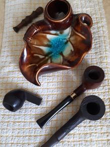 Three pipes with tamper, pipe holder and ashtray