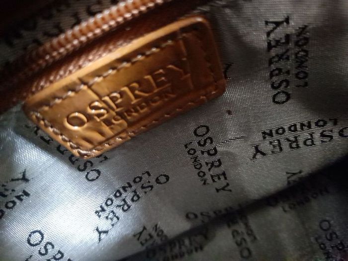 Osprey bag. Small tan leather bag with long shoulder strap