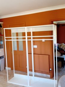 Two open wardrobe hanging rails Ikea Platsa