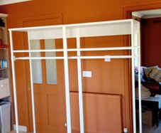 Two open wardrobe hanging rails Ikea Platsa