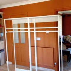Two open wardrobe hanging rails Ikea Platsa