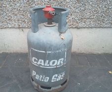 Patio gas bottle and regulator (around half full)