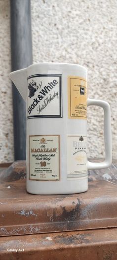 Scotch whiskey advertising jug, unusual with 4 brands on it ,nice to any collectors collection, lovely display item, price includes post to anywhere in Ireland thank you, sold as is