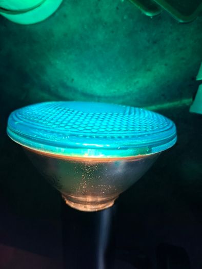 Large Theatrical or Display Lighting, including reflector lamps and colored PAR-style bulbs, with various lamp holders, plugs, and coiled electrical leads all working