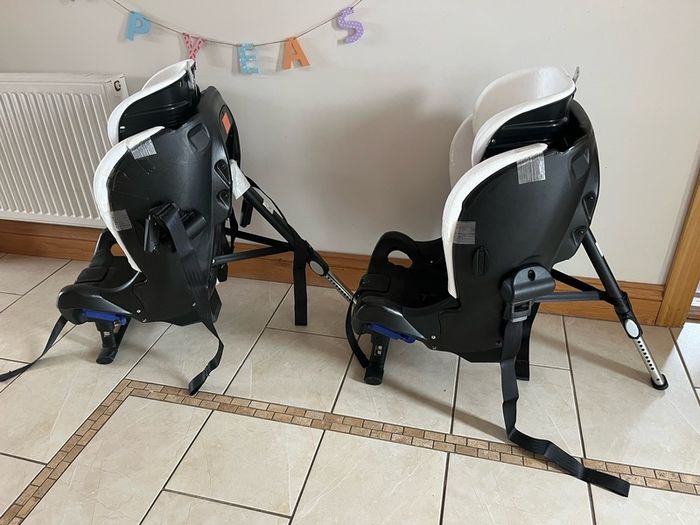 Axkid Minikid extended rear facing car seats x2