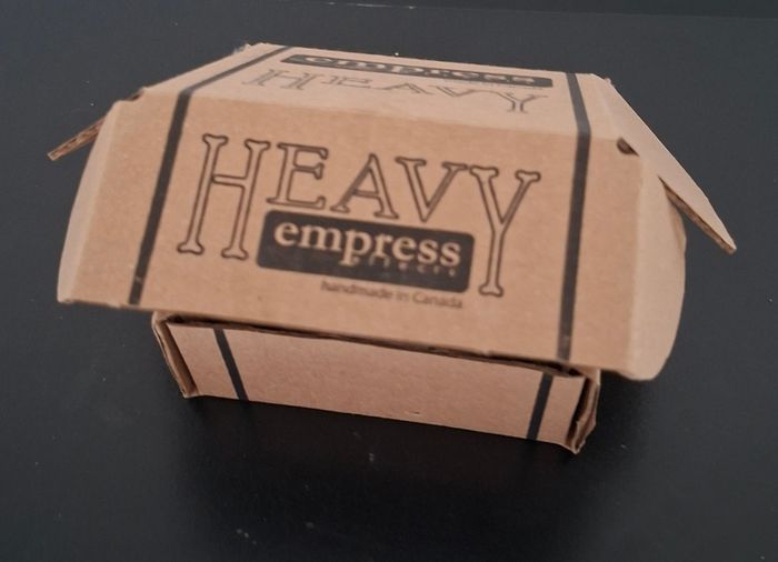Heavy Empress, distortion guitar pedal and power source.